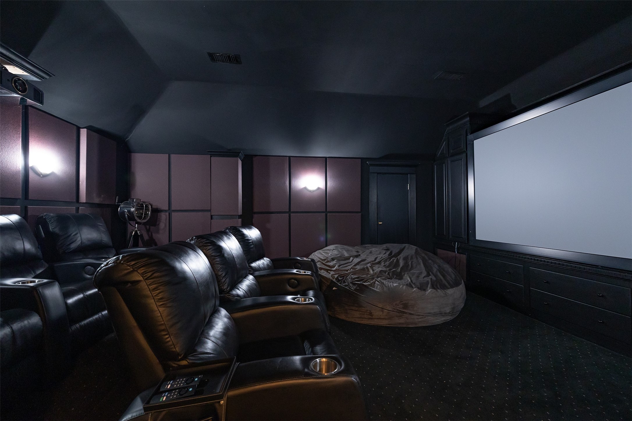 205 Grogans Point Road The Woodlands, TX 77380 - Photo 34 of 49 a room with furniture and chandelier