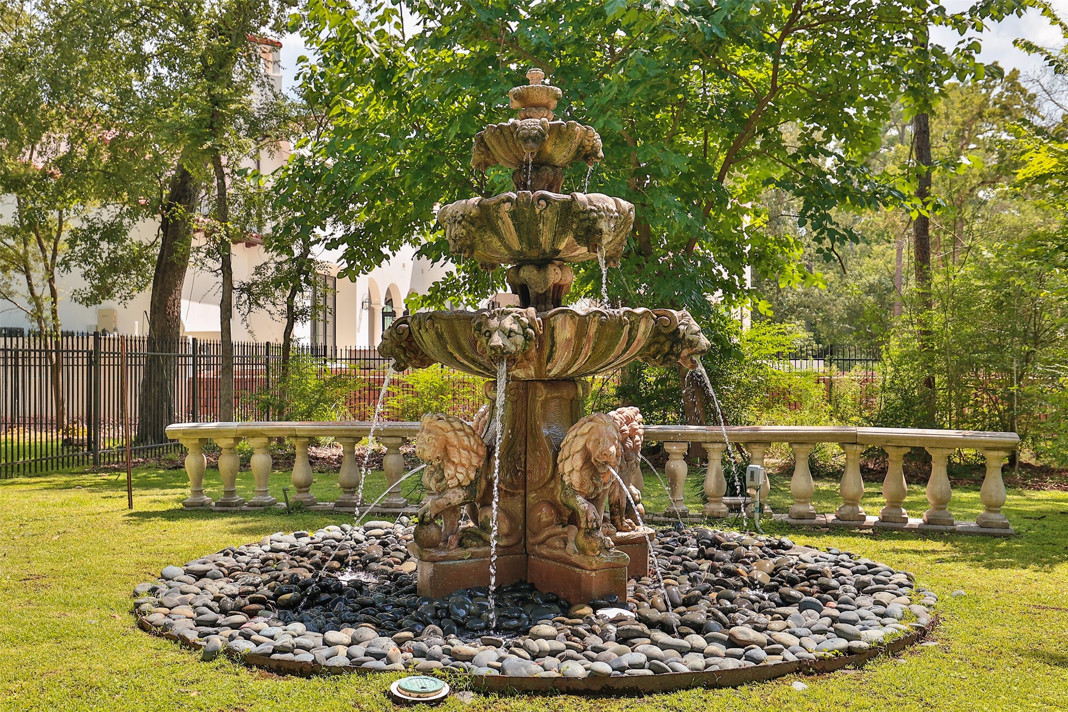 205 Grogans Point Road The Woodlands, TX 77380 - Photo 37 of 49 a view of a house with a yard