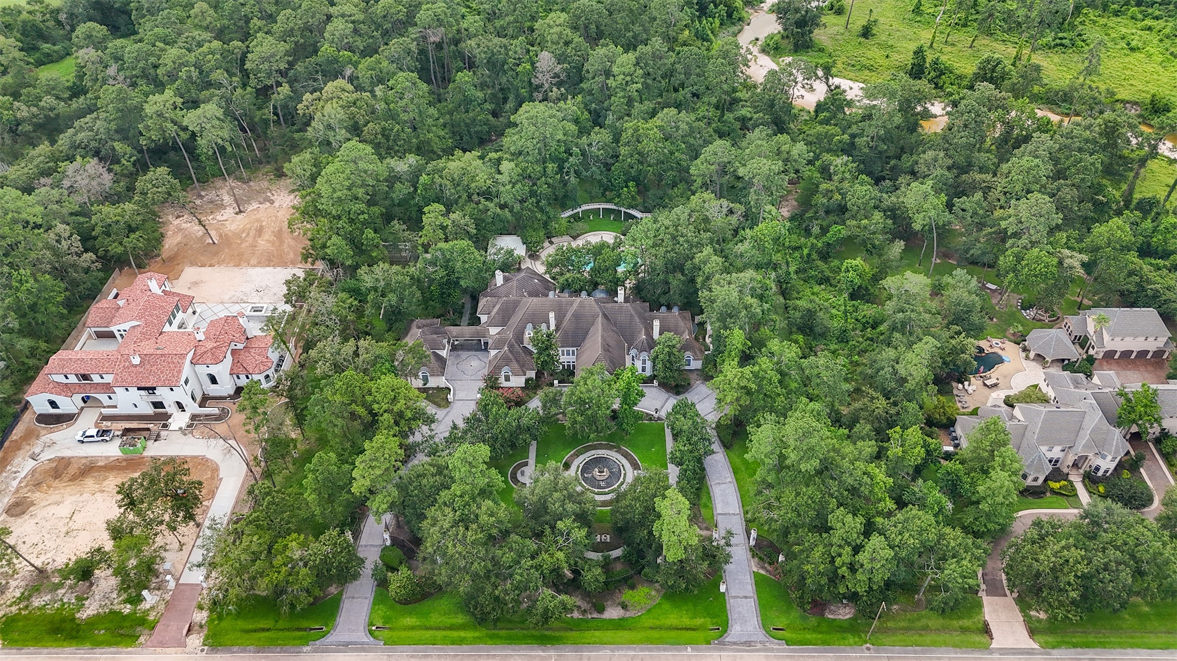 205 Grogans Point Road The Woodlands, TX 77380 - Photo 4 of 49 an aerial view of multiple house