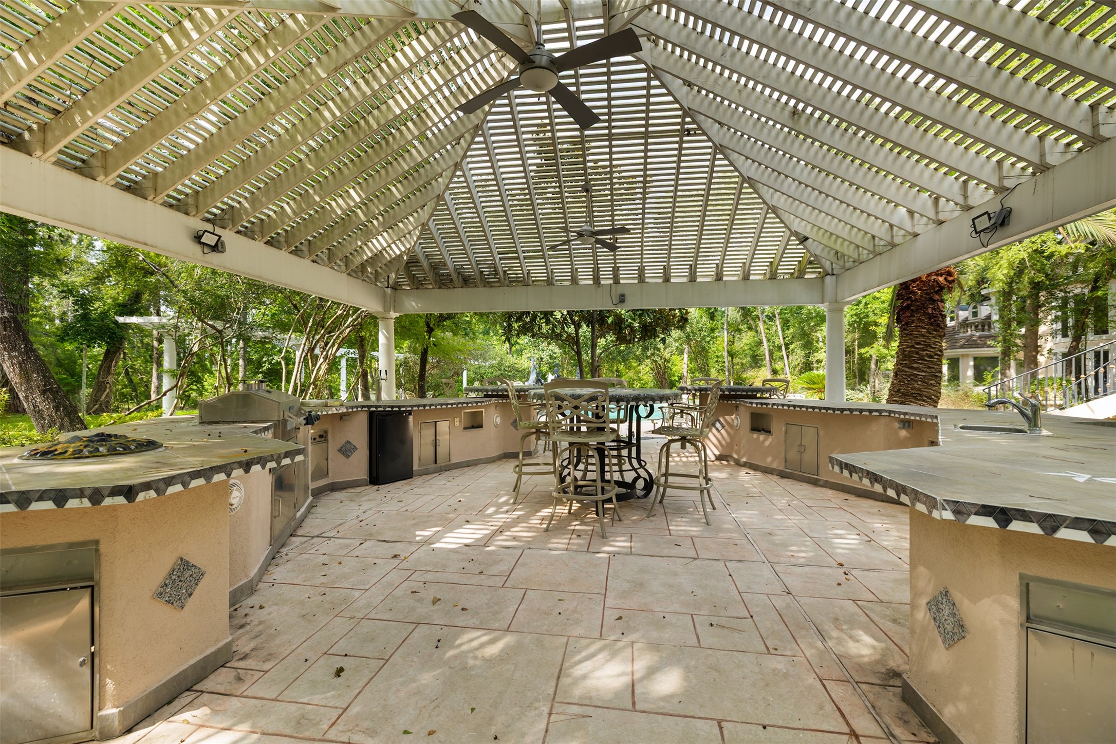 205 Grogans Point Road The Woodlands, TX 77380 - Photo 43 of 49 a outdoor view with a sitting space