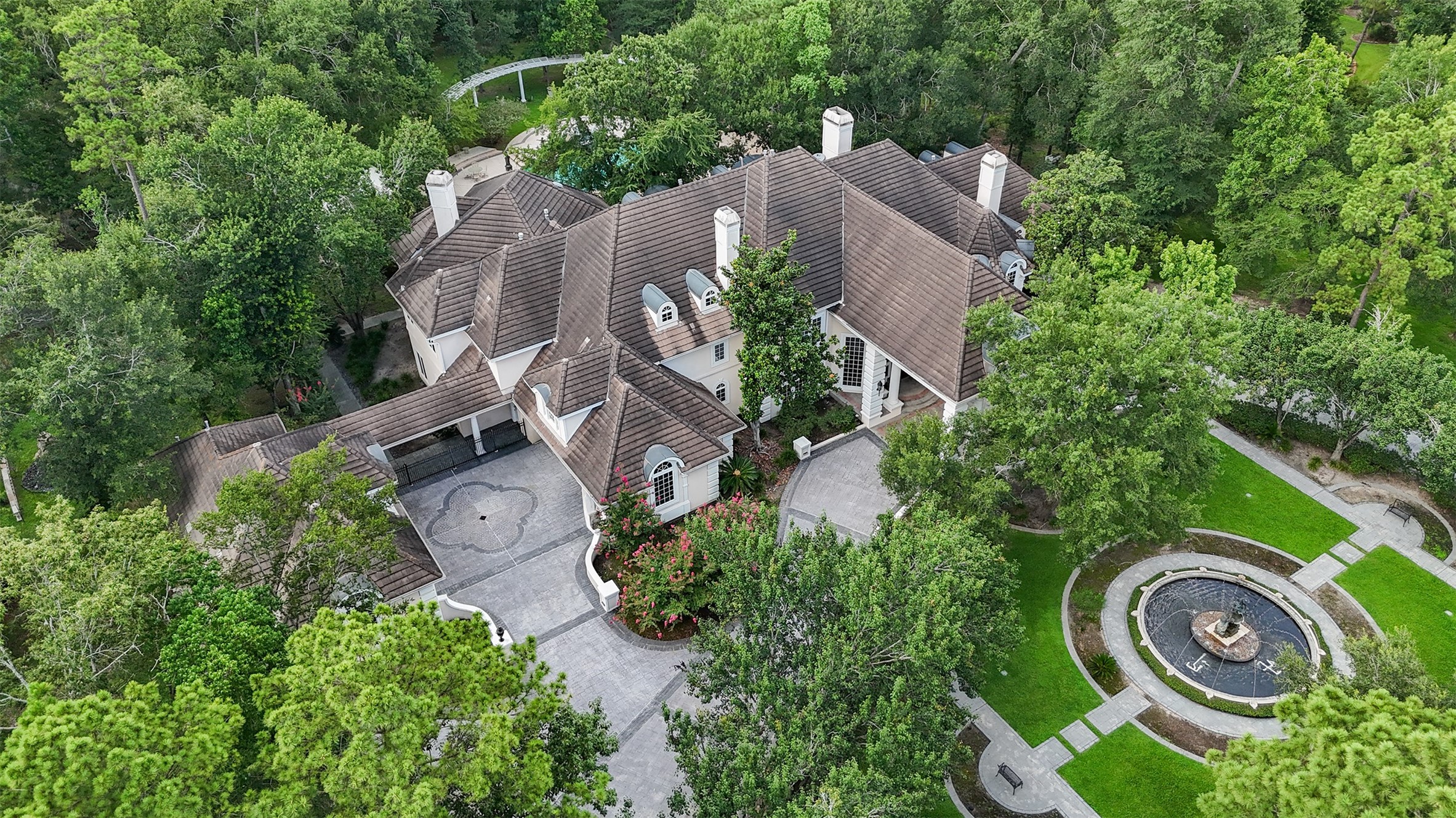 205 Grogans Point Road The Woodlands, TX 77380 - Photo 47 of 49 an aerial view of residential house with outdoor space and trees all around