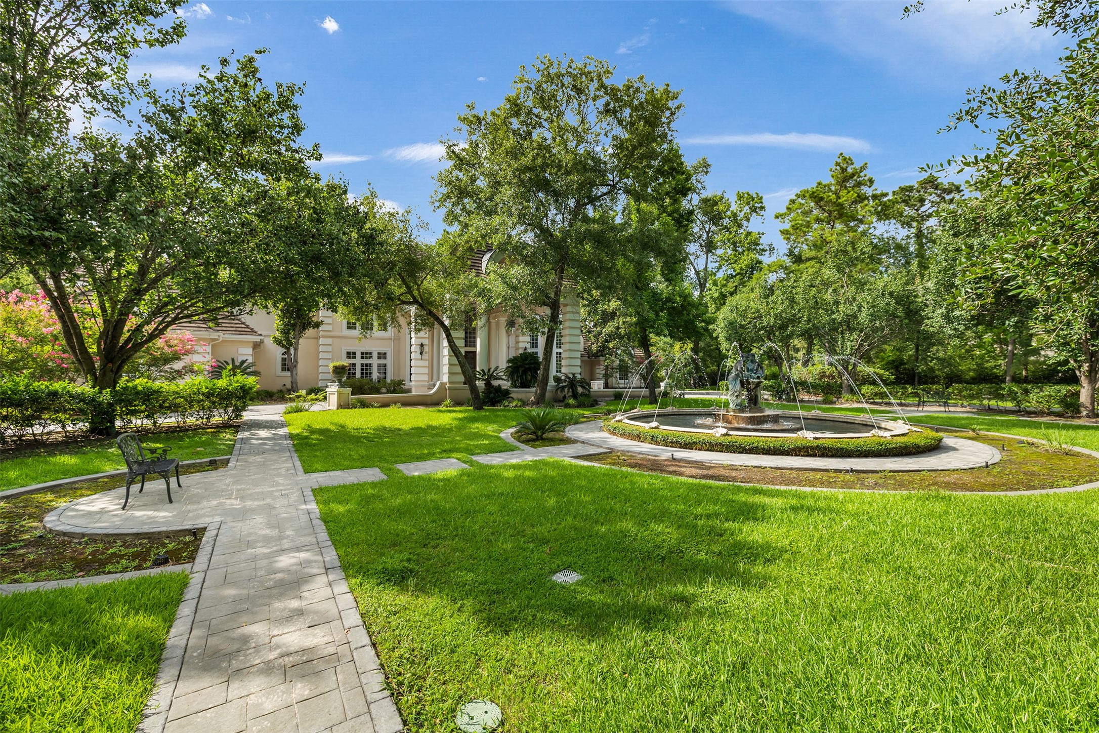 205 Grogans Point Road The Woodlands, TX 77380 - Photo 8 of 49 a view of swimming pool with a garden