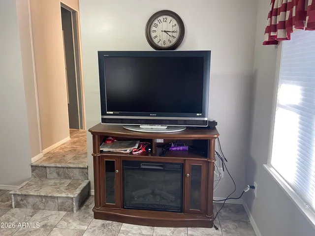 a stove top oven sitting inside of a kitchen