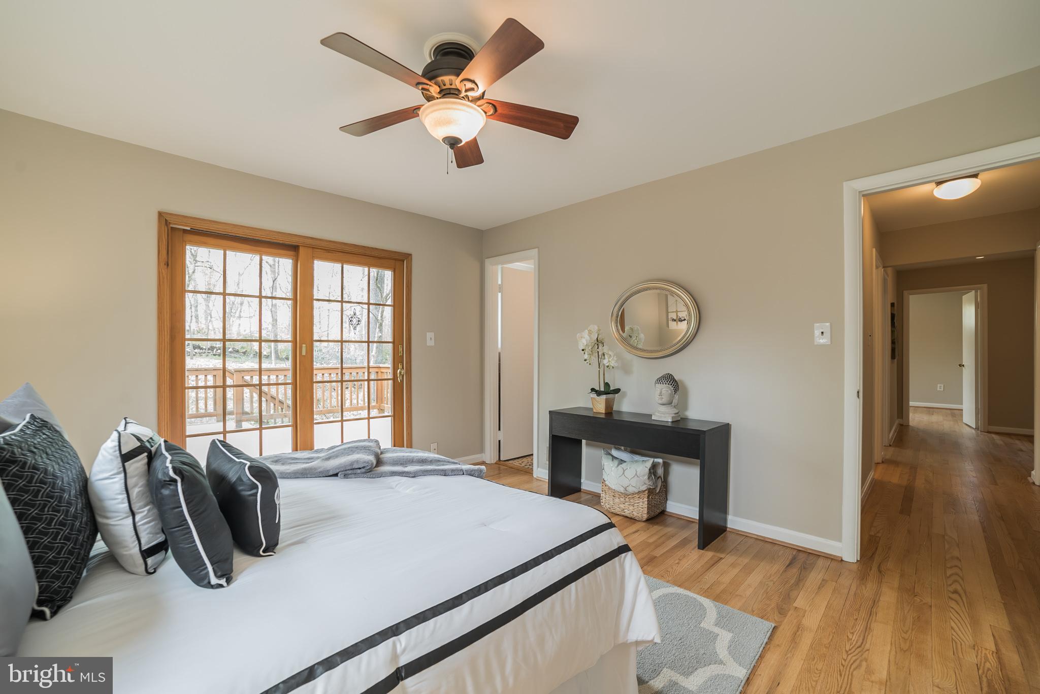 13616 Wendover Road Silver Spring, MD 20904 - Photo 15 of 30 Master bedroom towards private bathroom and deck