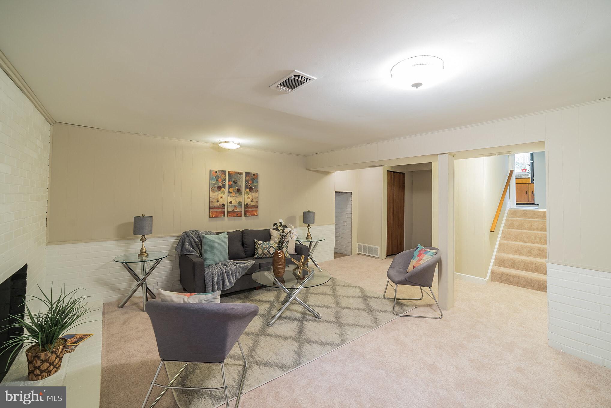 13616 Wendover Road Silver Spring, MD 20904 - Photo 24 of 30 Recreation room towards stairway