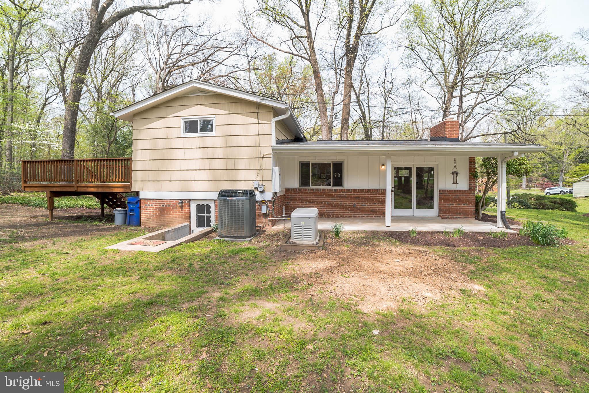 13616 Wendover Road Silver Spring, MD 20904 - Photo 28 of 30 Side of home showing patio & lower level entrance