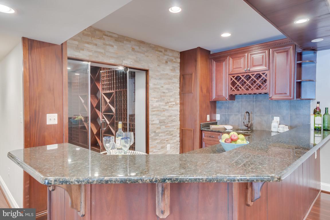 204 Adahi Road Southeast Vienna, VA 22180 - Photo 34 of 58 Wine Cellar behind the Wet Bar