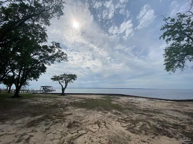 a view of beach and lake