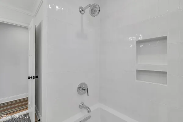 a bathroom with a bathtub