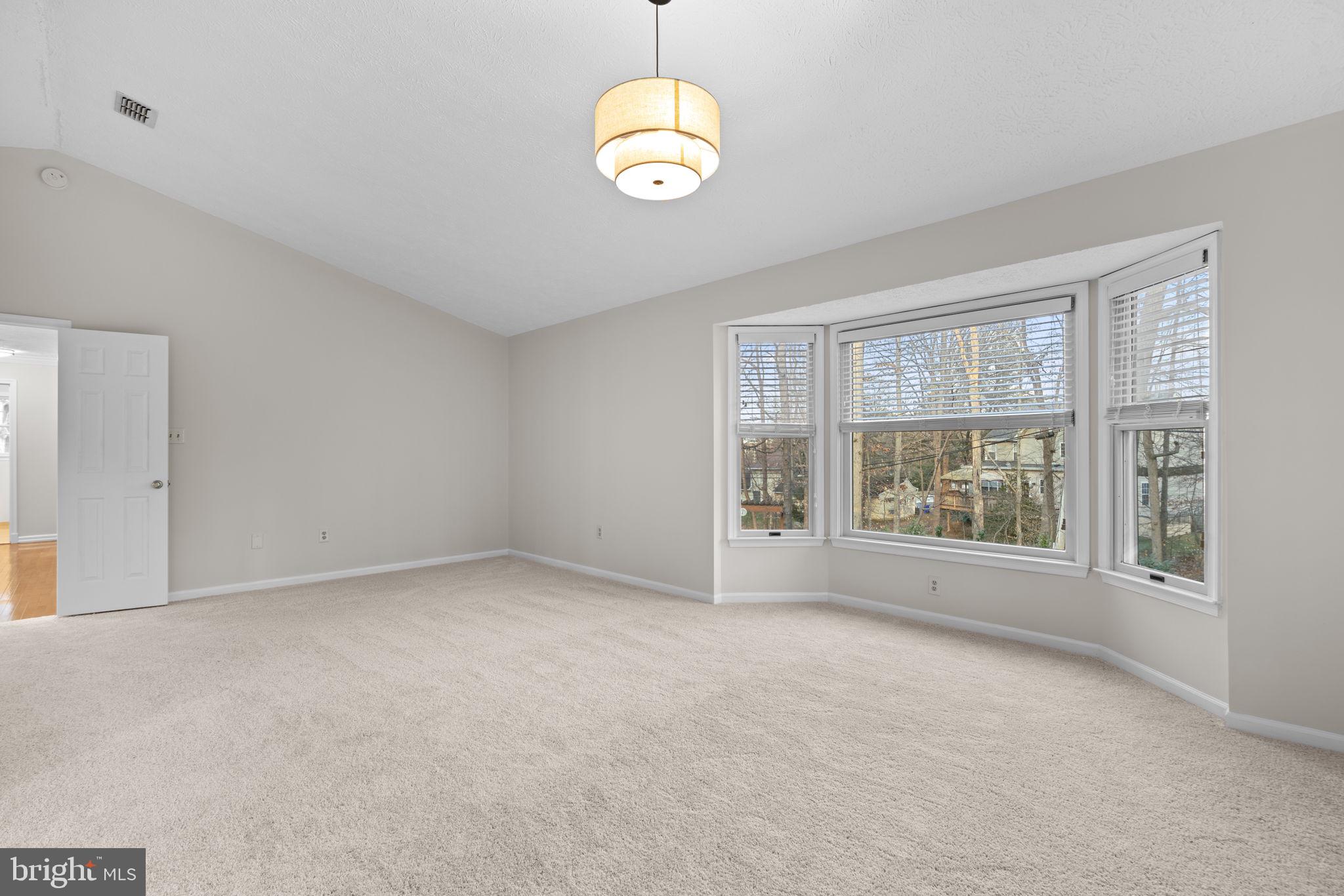 6241 Martin Road Columbia, MD 21044 - Photo 25 of 53 Primary ensuite sitting area with bay windows