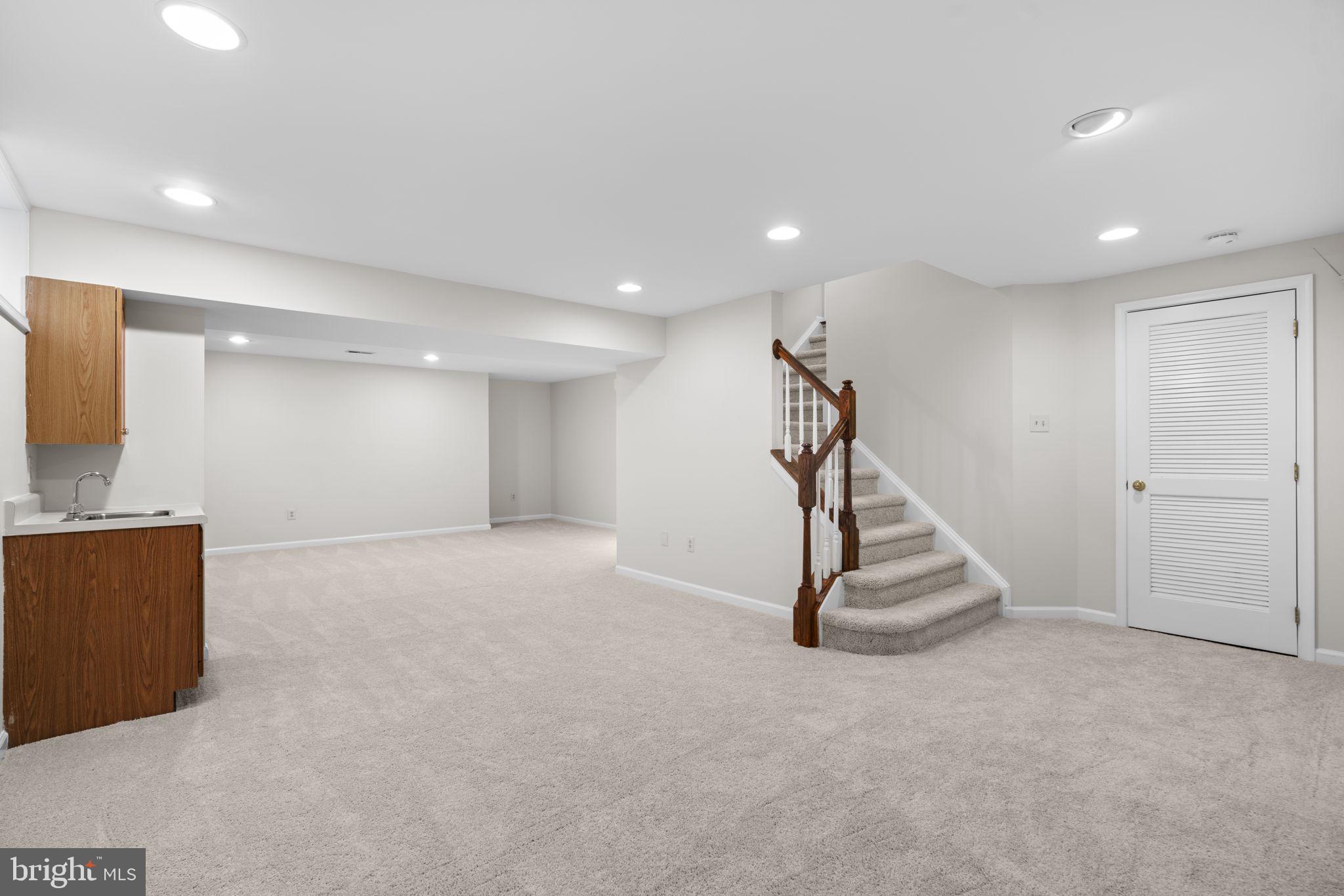 6241 Martin Road Columbia, MD 21044 - Photo 42 of 53 a view of an empty room with wooden floor