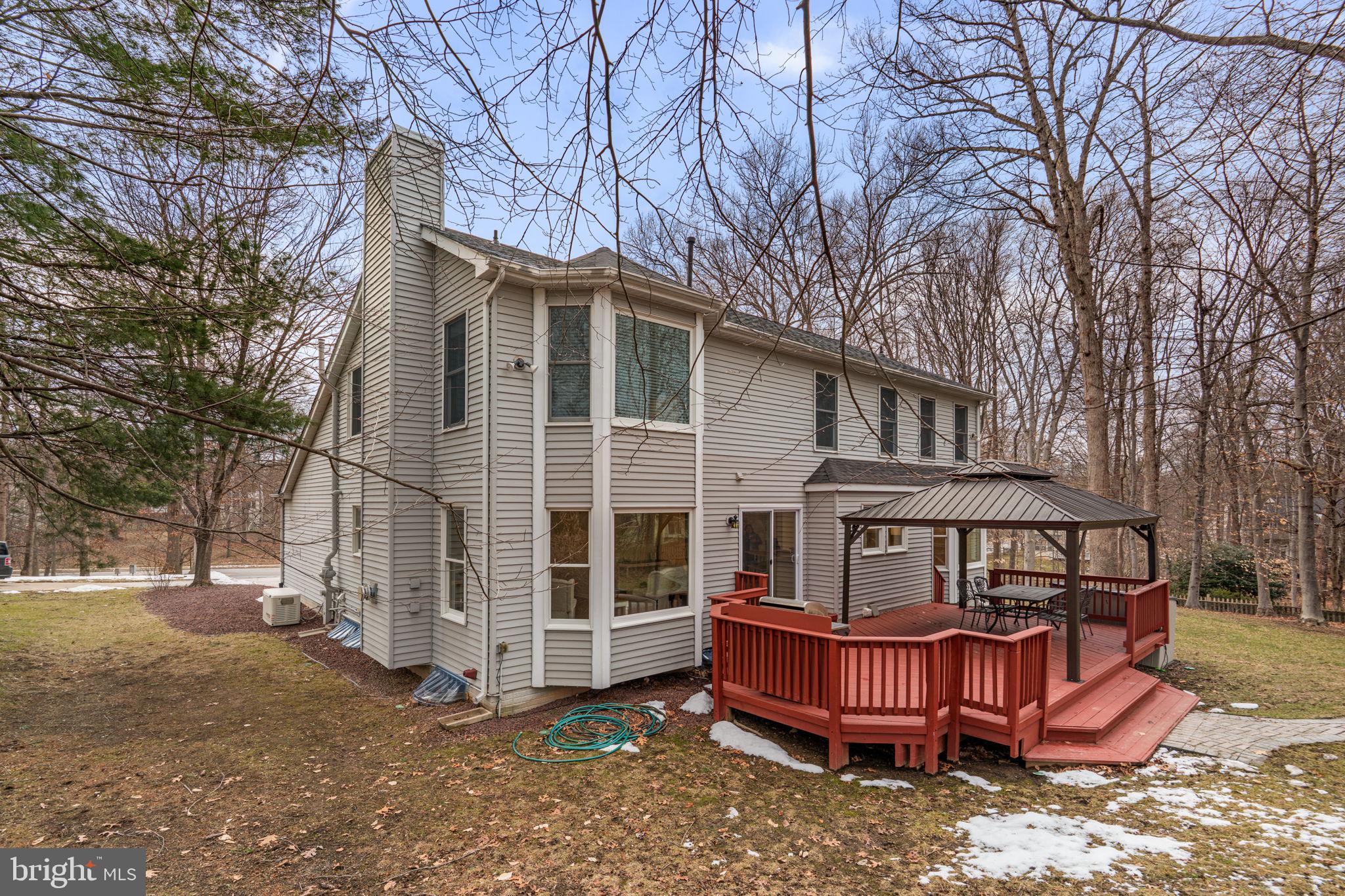 6241 Martin Road Columbia, MD 21044 - Photo 52 of 53 a view of a house with a yard