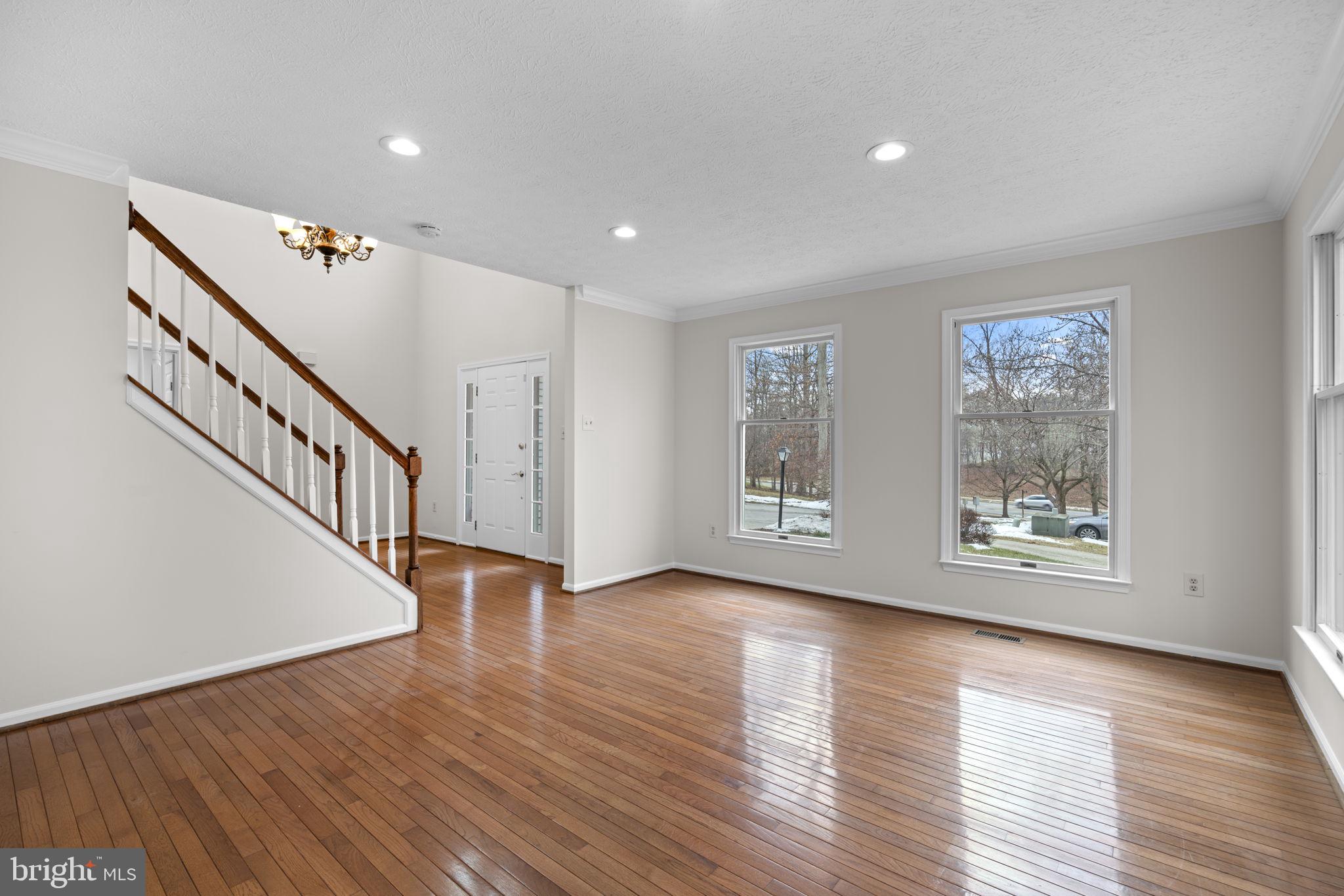 6241 Martin Road Columbia, MD 21044 - Photo 6 of 53 a view of an entryway with wooden floor and windows