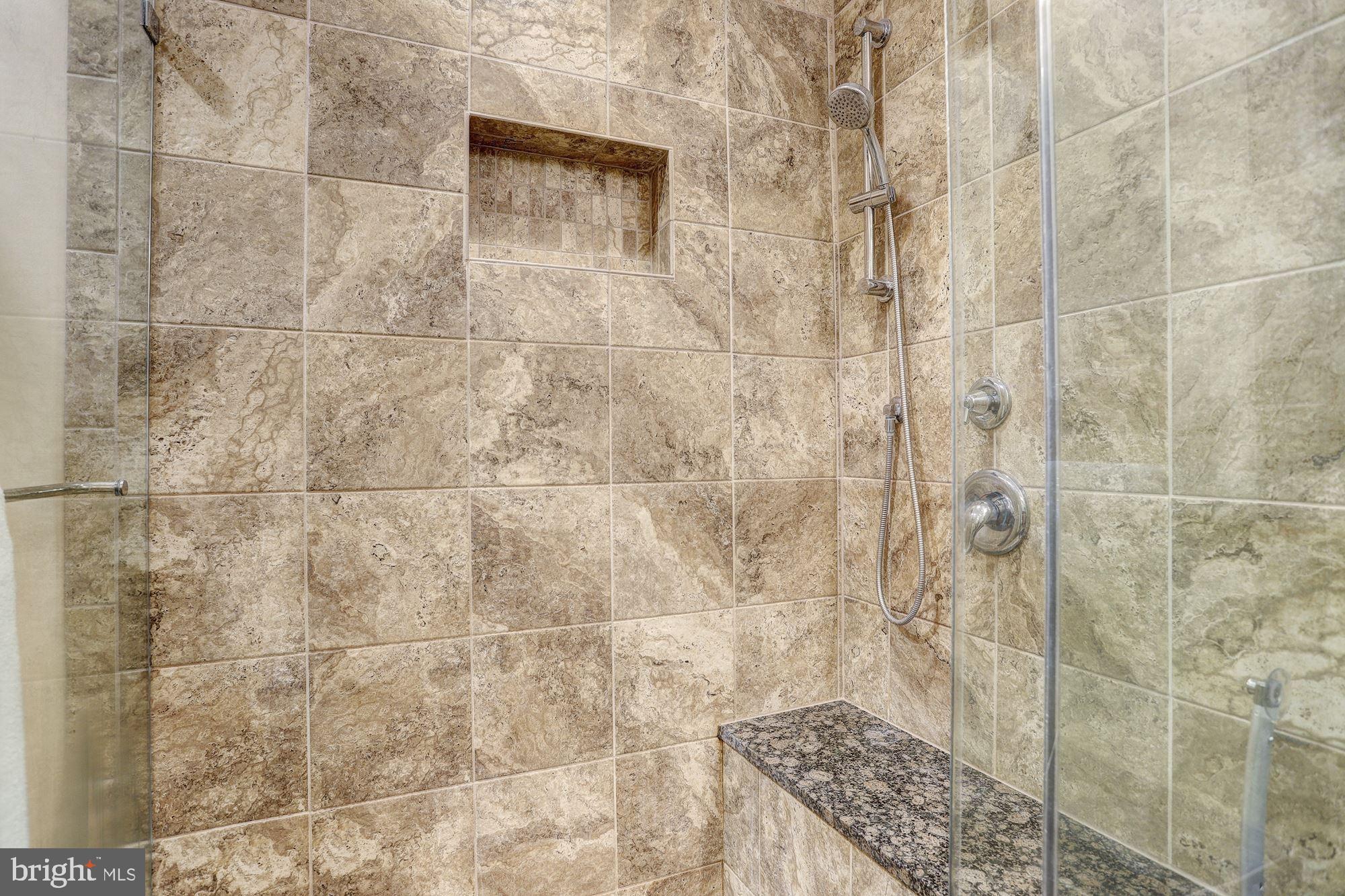 400 Symphony Circle, Unit 354D Cockeysville, MD 21030 - Photo 15 of 33 a bathroom with a shower