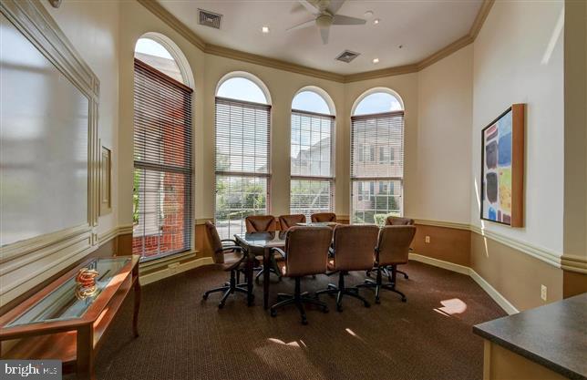 400 Symphony Circle, Unit 354D Cockeysville, MD 21030 - Photo 24 of 33 a view of a dining room with furniture window and outside view