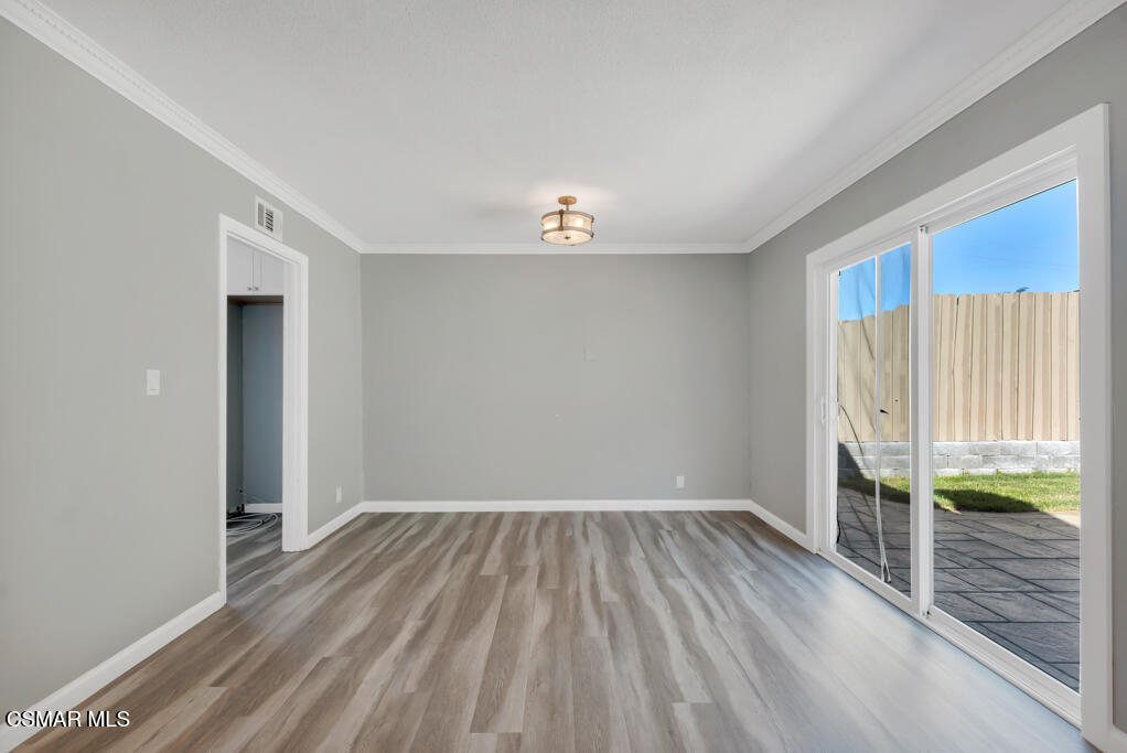 896 Moffatt Circle Simi Valley, CA 93065 - Photo 15 of 50 a view of a room with wooden floor and a window