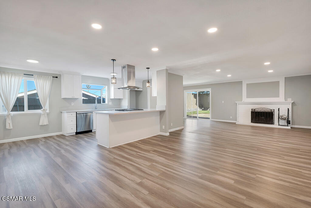 896 Moffatt Circle Simi Valley, CA 93065 - Photo 25 of 50 a view of a kitchen with cabinets and wooden floor