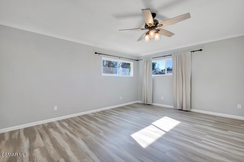 896 Moffatt Circle Simi Valley, CA 93065 - Photo 26 of 50 wooden floor in an empty room with a window
