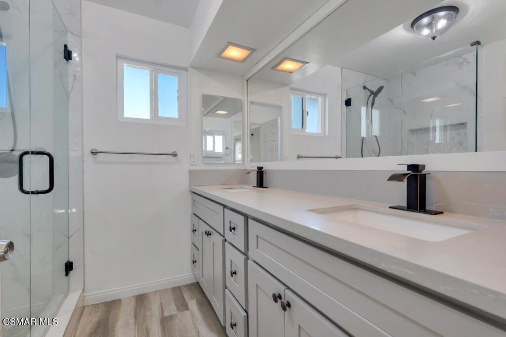 896 Moffatt Circle Simi Valley, CA 93065 - Photo 27 of 50 a bathroom with a sink and a mirror