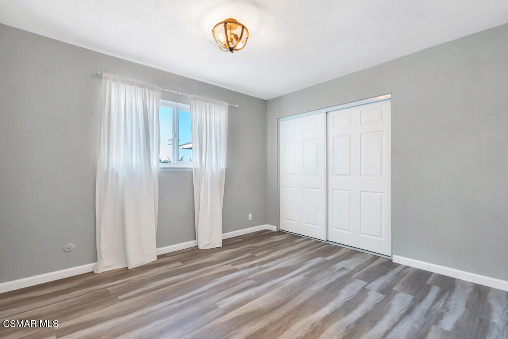 896 Moffatt Circle Simi Valley, CA 93065 - Photo 34 of 50 a view of a room with wooden floor and a window