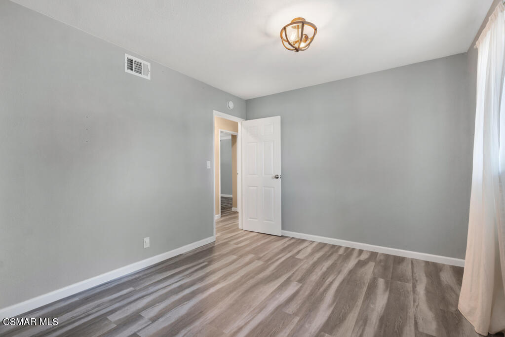 896 Moffatt Circle Simi Valley, CA 93065 - Photo 35 of 50 a view of an empty room with a window