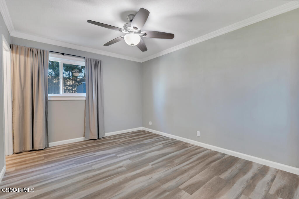 896 Moffatt Circle Simi Valley, CA 93065 - Photo 36 of 50 wooden floor in an empty room with a window