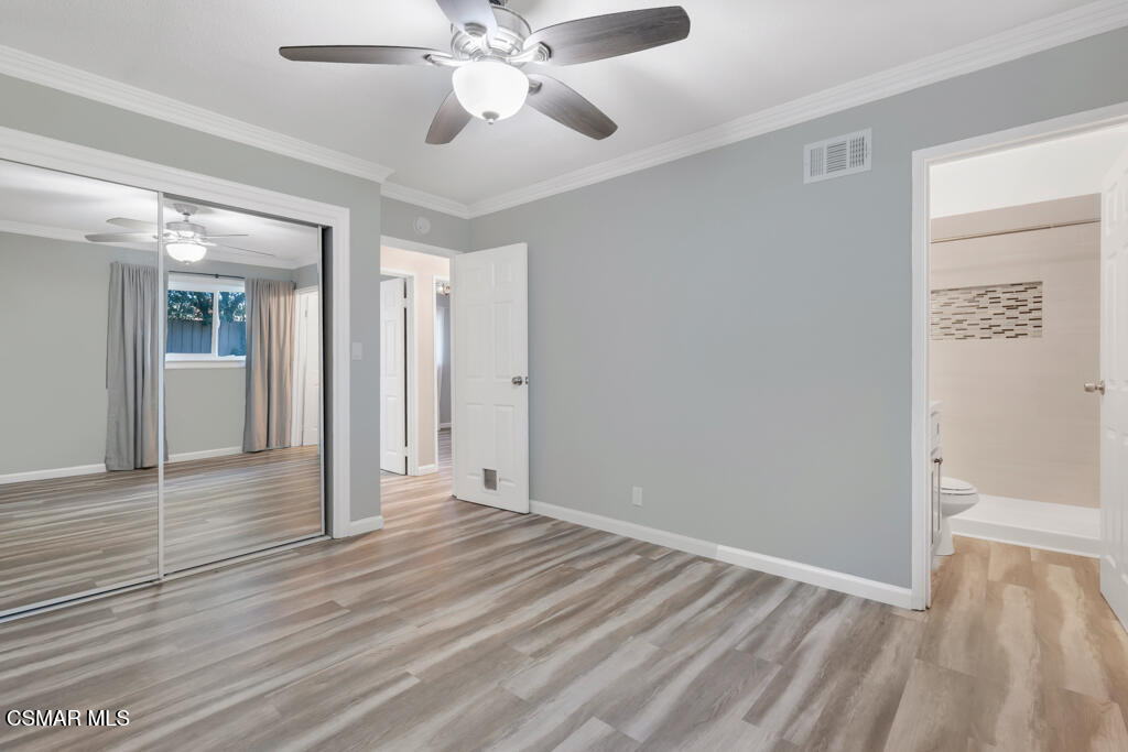 896 Moffatt Circle Simi Valley, CA 93065 - Photo 37 of 50 wooden floor in an empty room with a window