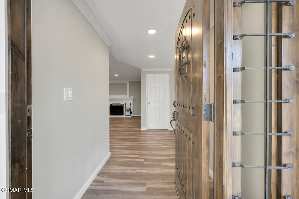 896 Moffatt Circle Simi Valley, CA 93065 - Photo 4 of 50 a view of a hallway with wooden floor and staircase