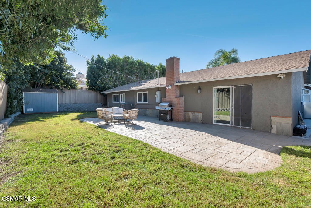 896 Moffatt Circle Simi Valley, CA 93065 - Photo 41 of 50 a house view with a sitting space and garden space