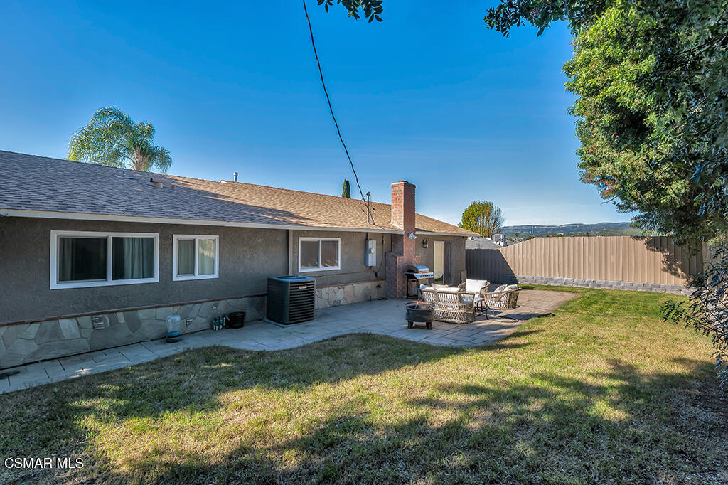 896 Moffatt Circle Simi Valley, CA 93065 - Photo 42 of 50 a front view of a house with a yard