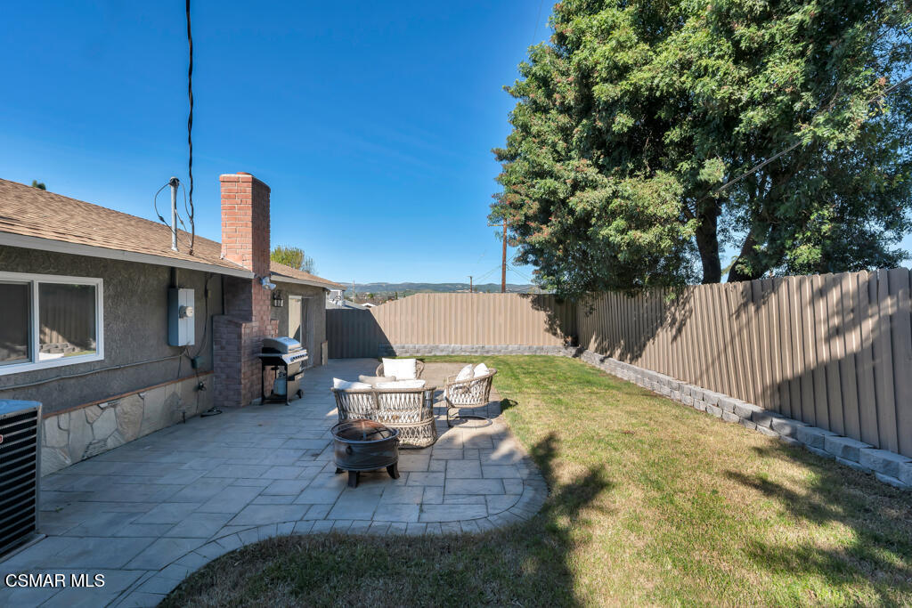 896 Moffatt Circle Simi Valley, CA 93065 - Photo 44 of 50 a view of backyard with barbeque grill and outdoor seating