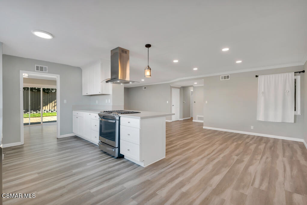 896 Moffatt Circle Simi Valley, CA 93065 - Photo 8 of 50 a view of kitchen with sink and wooden floor