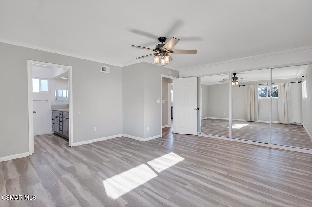 896 Moffatt Circle Simi Valley, CA 93065 - Photo 10 of 50 wooden floor in an empty room with a window
