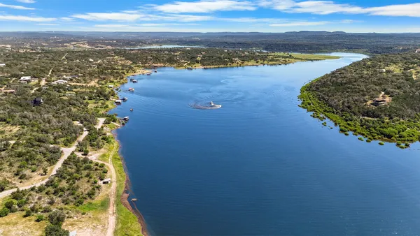 a view of an ocean and city