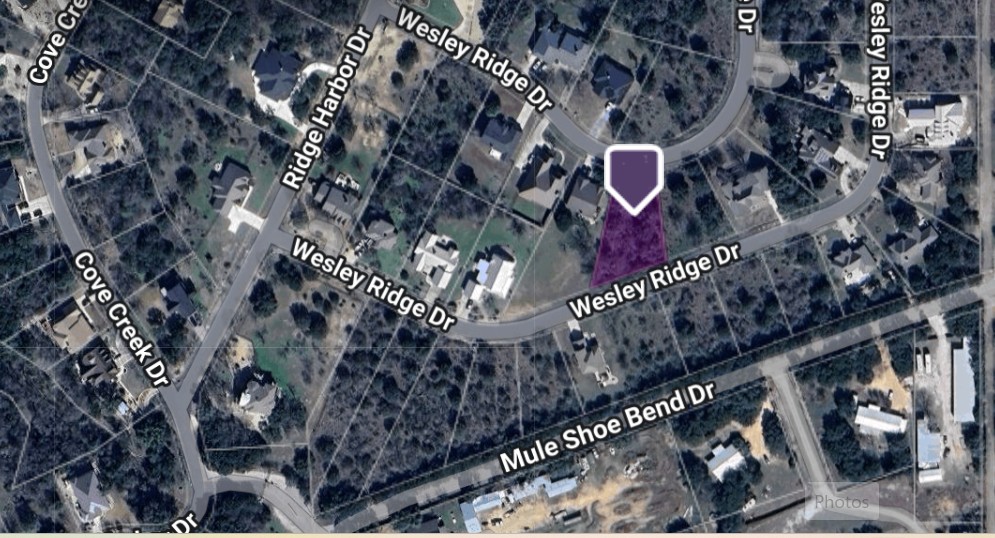 Lot 80 Wesley Ridge Drive Spicewood, TX 78669 - Photo 12 of 12 a city view with tall buildings