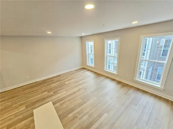 an empty room with windows