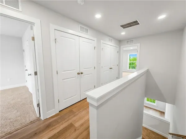 a bathroom with a sink vanity and a mirror