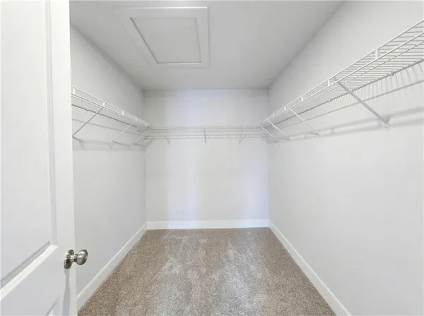 a bathroom with a toilet and a bathtub