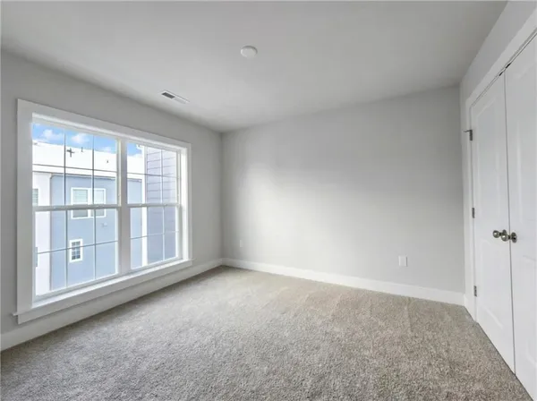 a view of a balcony with chairs