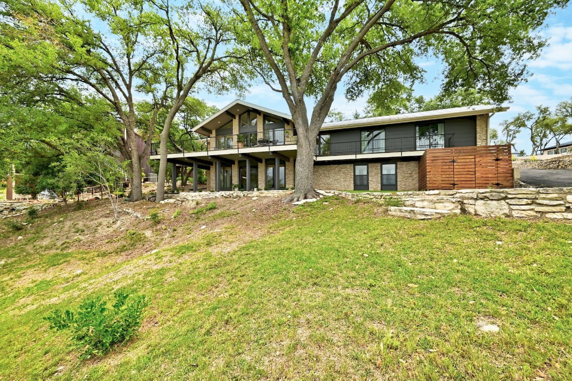 323 Explorer Lakeway, TX 78734 - Photo 1 of 1 a front view of a house with a yard