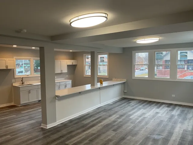 a view of a kitchen and window