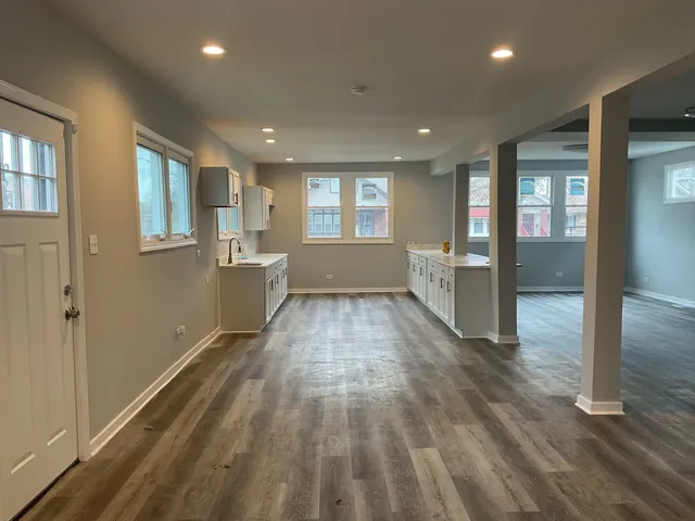 a view of an empty room and window