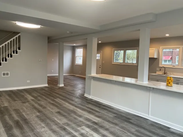 a view of entryway with wooden floor