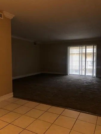 a kitchen with cabinets and appliances