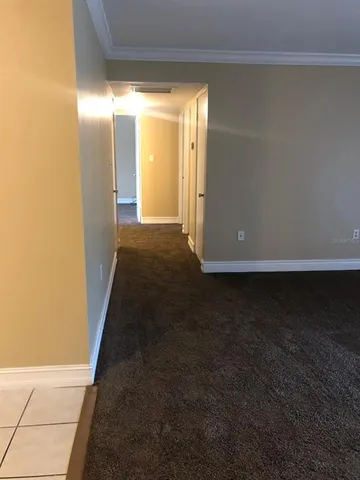 a bathroom with a sink a toilet a mirror and shower