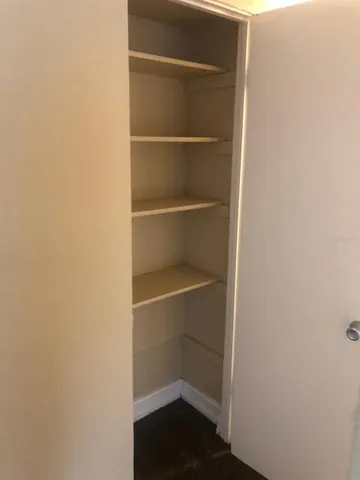 an empty room with closet