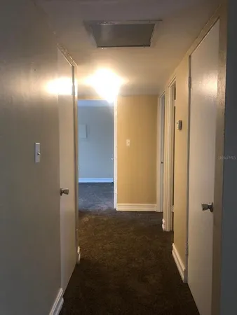 an empty room with an empty space and a window