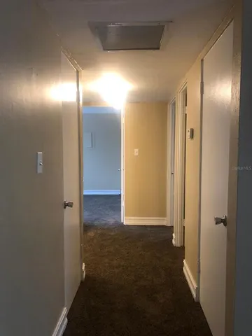 an empty room with an empty space and a window