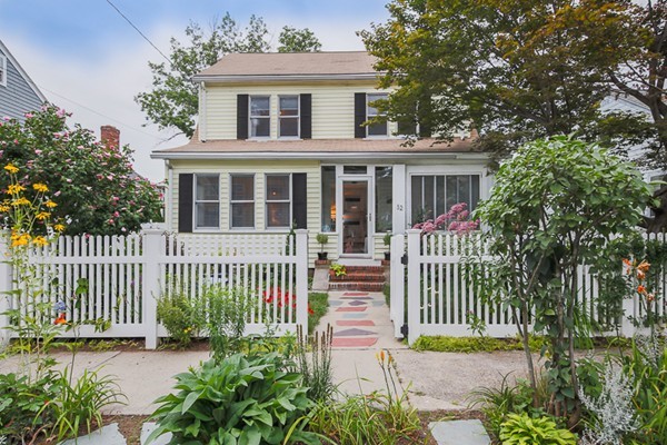 52 Aberdeen Road Arlington, MA 02476 - Photo 1 of 30 a front view of a house with a garden