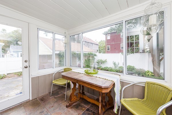 52 Aberdeen Road Arlington, MA 02476 - Photo 13 of 30 a view of a dining room with furniture and a window